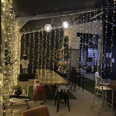 a room filled with furniture and a large window