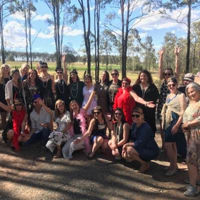 a group of people posing for the camera