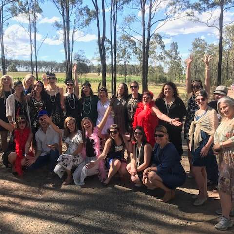 a group of people posing for the camera