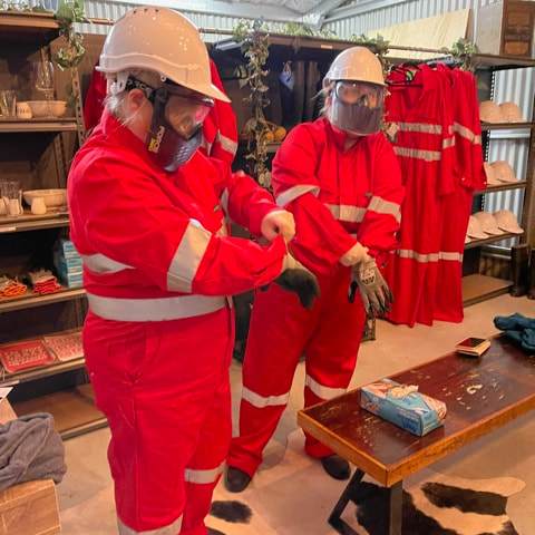 a group of people standing in a room