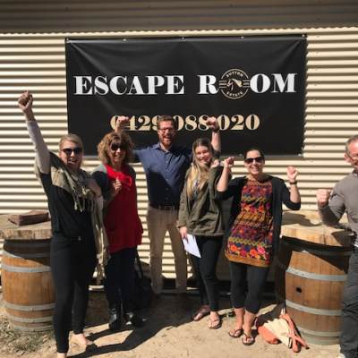 a group of people standing in front of a building