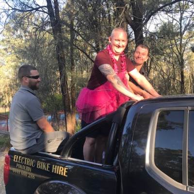 a man and a woman sitting in a car