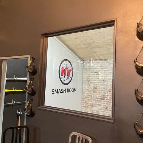 a room with a sink and a mirror