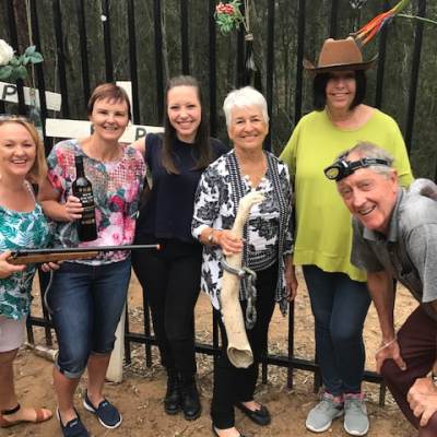 a group of people posing for the camera