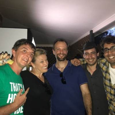 a group of people posing for the camera