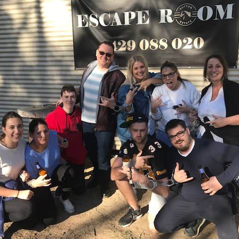 a group of people posing for a photo