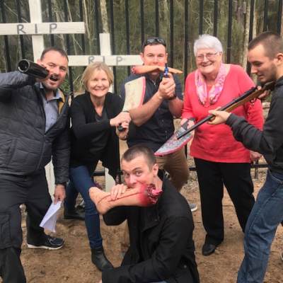 a group of people standing in front of a crowd