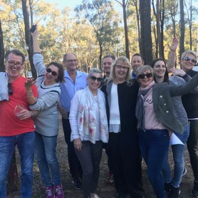 a group of people posing for the camera
