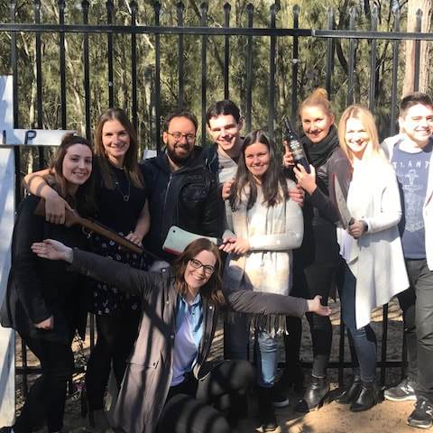 a group of people posing for a photo